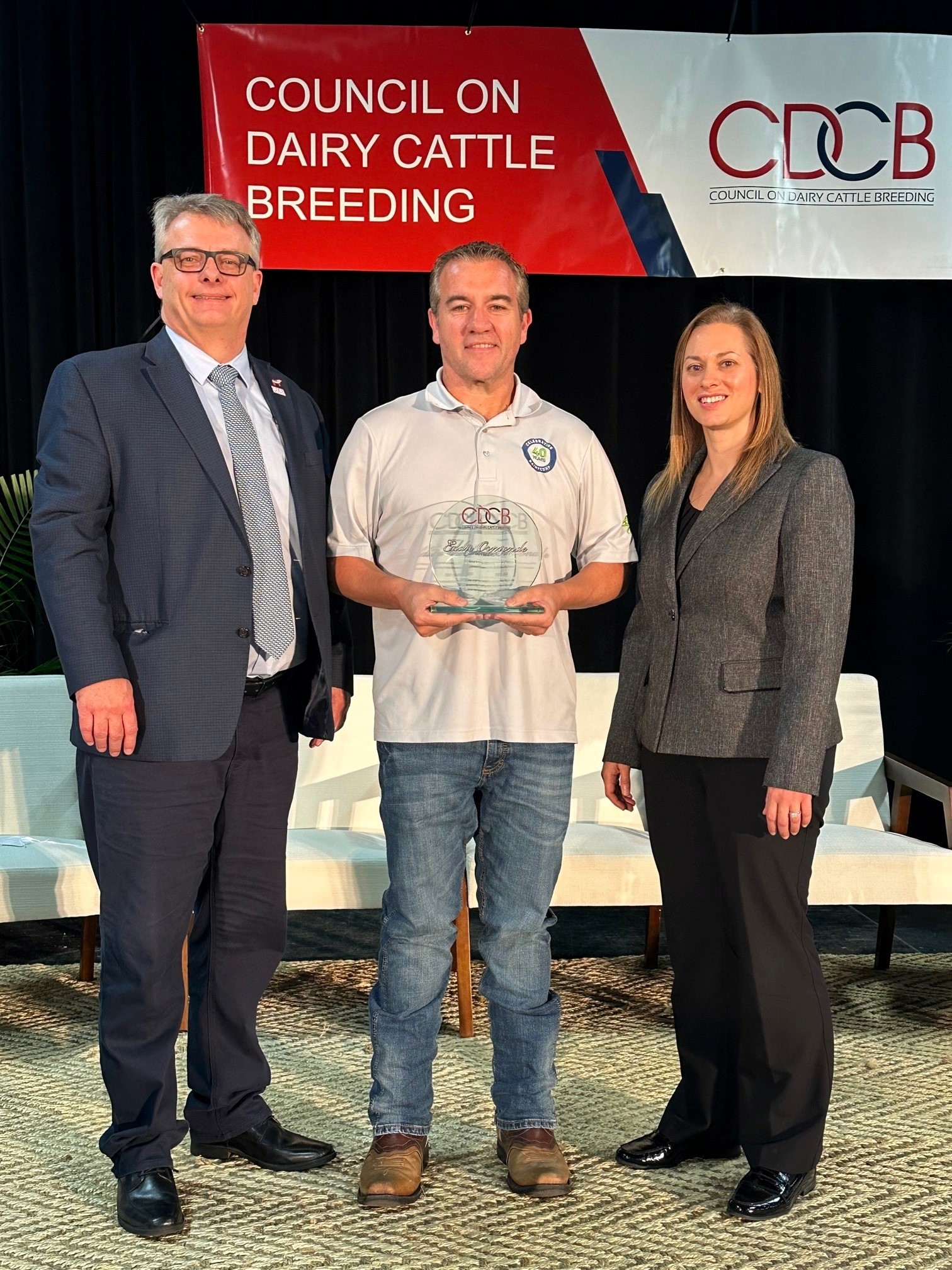 Eddie Ormonde of VAS (middle) was recognized by João Dürr and Lindsey Worden for his service on the CDCB Board of Directors.