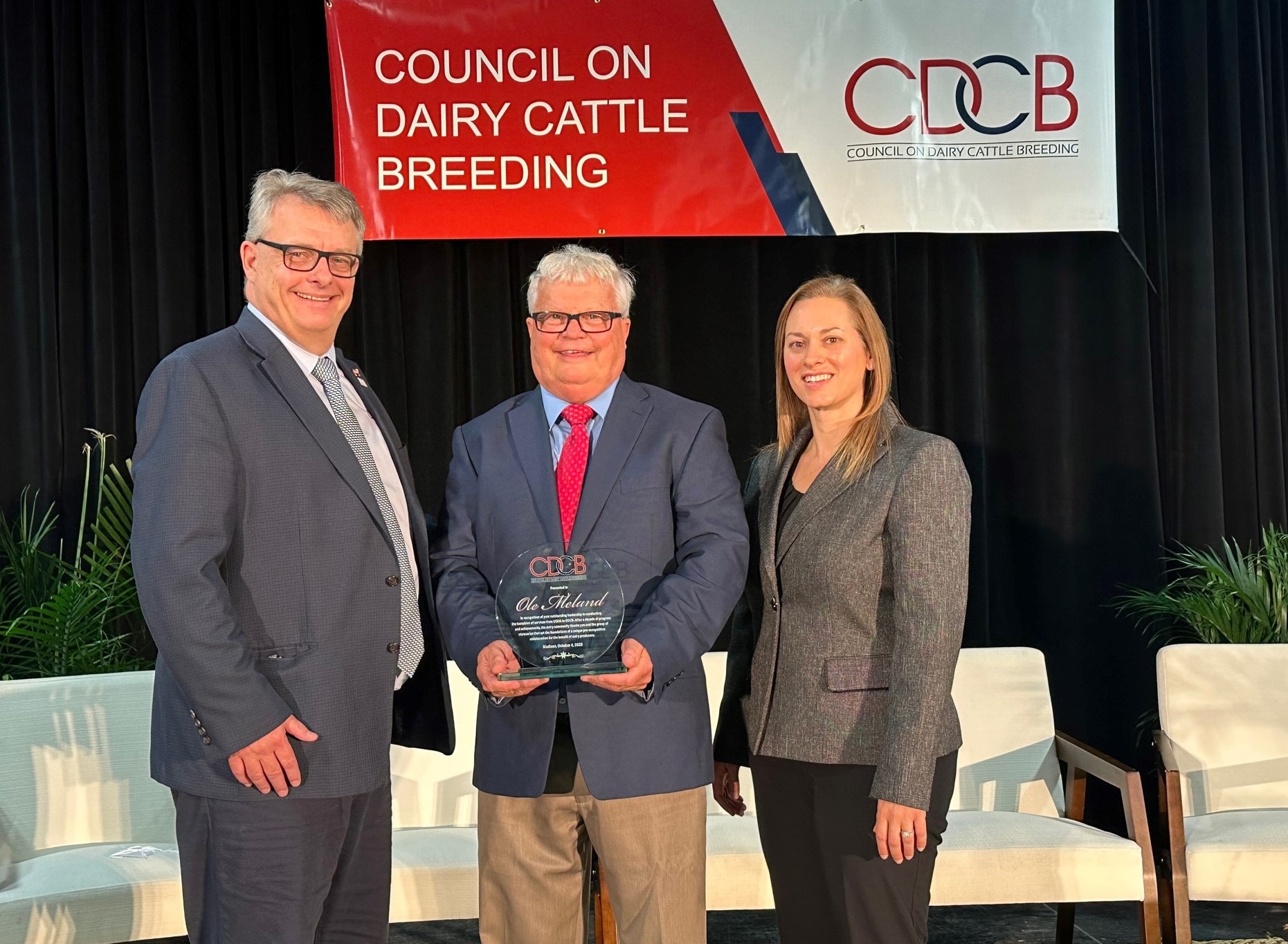 Ole Meland (middle) was CDCB Chair in 2013-14, when more than 75 individuals from A.I. organizations, milk recording, dairy records processing and breed associations collaborated through the CDCB Board and various committees and working groups to provide direction and functional support as the genetic services transitioned from USDA to CDCB.